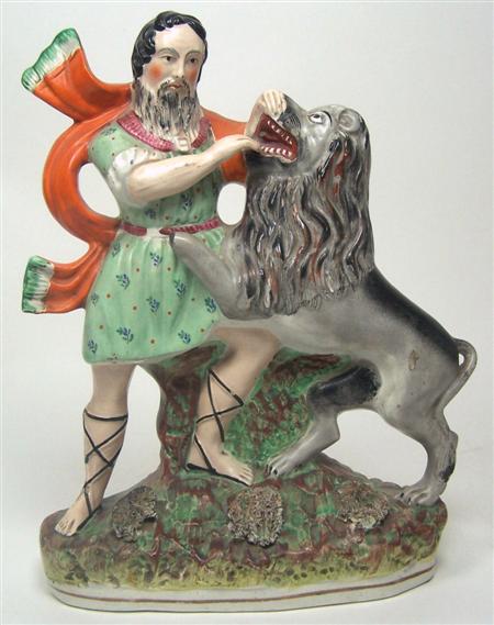 Appraisal: A large Staffordshire figure of Hercules fighting the Nemean lion