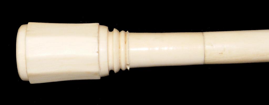 Appraisal: Mid th century ivory walking cane with a faceted turned