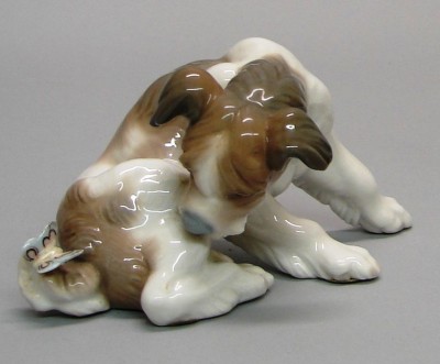 Appraisal: LLADRO - Dog and Butterfly - G Retired Good condition