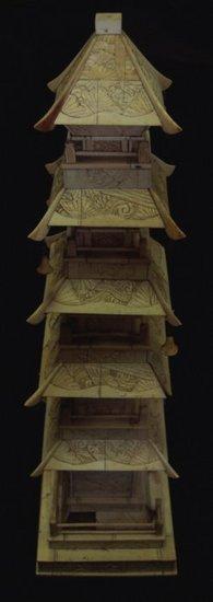 Appraisal: A Japanese carved ivory tower the base fitted hinged door