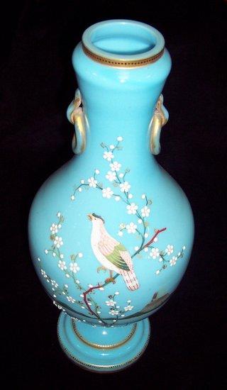 Appraisal: A Victorian blue glass vase highlighted in gilt and decorated