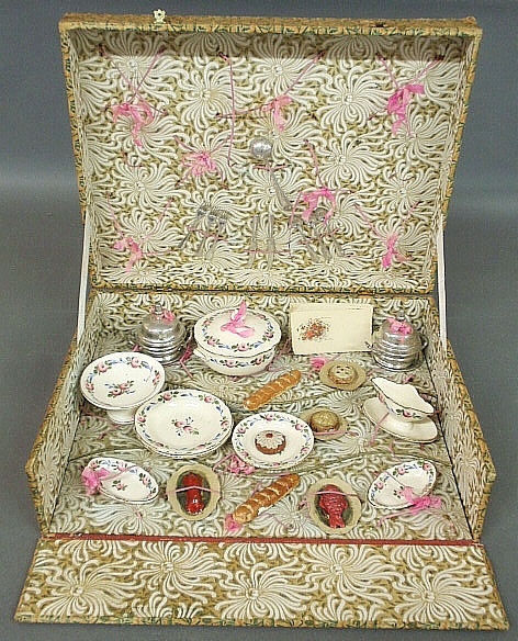 Appraisal: - French miniature seaside picnic service in a wallpapered box