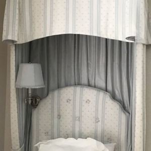 Appraisal: A Pair of Twin Upholstered Headboards with Matching Valances Bedskirts