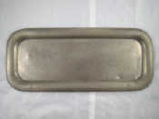 Appraisal: Tudric A Liberty's hammered oblong pewter tray with rolled edge