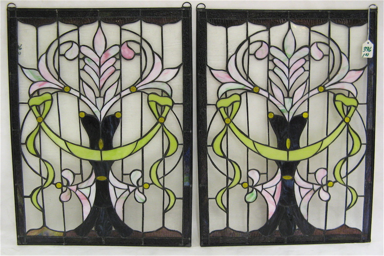 Appraisal: PAIR ART NOUVEAU STYLE STAINED AND LEADED GLASS WINDOW PANELS