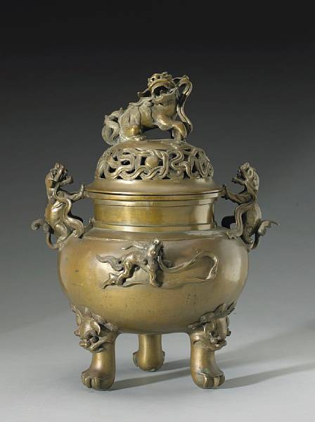 Appraisal: A cast bronze covered tripod censer Xuande Mark th Century