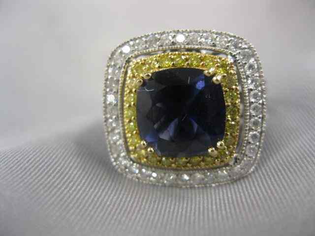 Appraisal: Iolite Diamond Ring carat cushion shape mixed cut gems surrounded