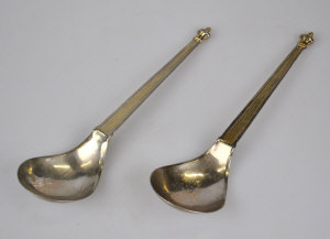 Appraisal: A pair of Continental white metal spoons the bowls with