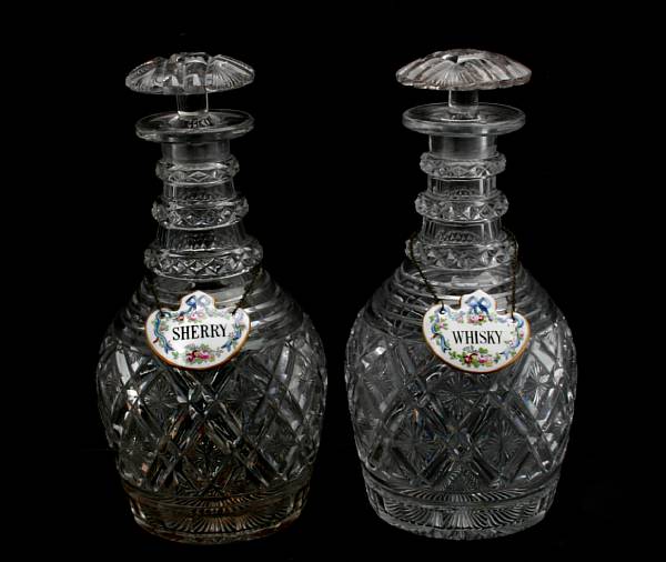 Appraisal: A pair of Regency style cut glass decanters and stoppers