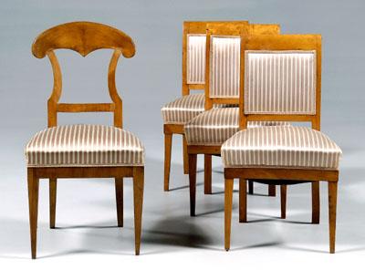 Appraisal: Four Biedermeier side chairs fruitwood three nearly matched scrolled and