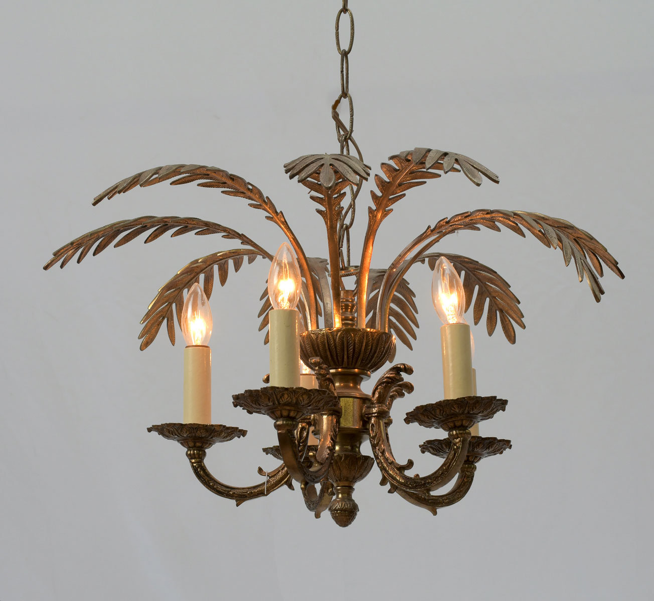 Appraisal: LIGHT BRASS PALM TREE CHANDELIER Scrolling foliate arms with faux