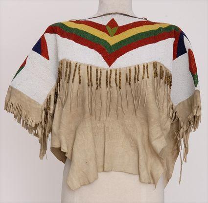 Appraisal: NORTHERN PLAINS BUCKSKIN SHIRT With beaded yoke approx x in