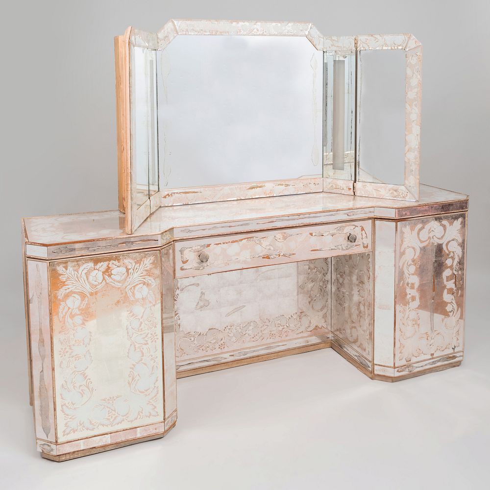 Appraisal: Art Moderne Mirrored Dressing Table Fitted with a three fold