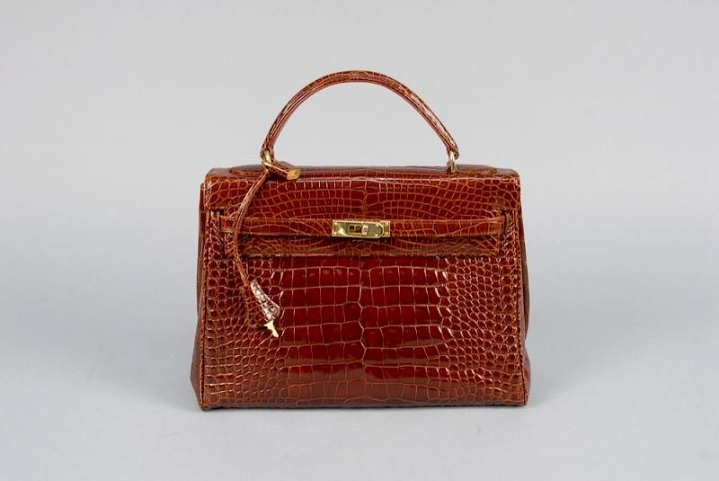 Appraisal: REVILLON REPTILE EMBOSSED KELLY STYLE BAG Cognac faux crocodile with