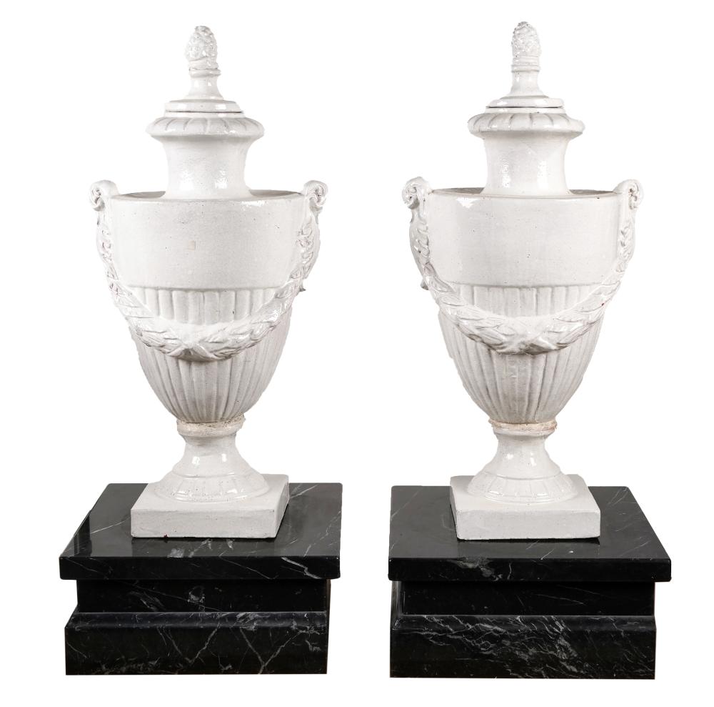 Appraisal: PAIR OF NEOCLASSIC GLAZED TERRACOTTA-COVERED URNSeach with custom square marble