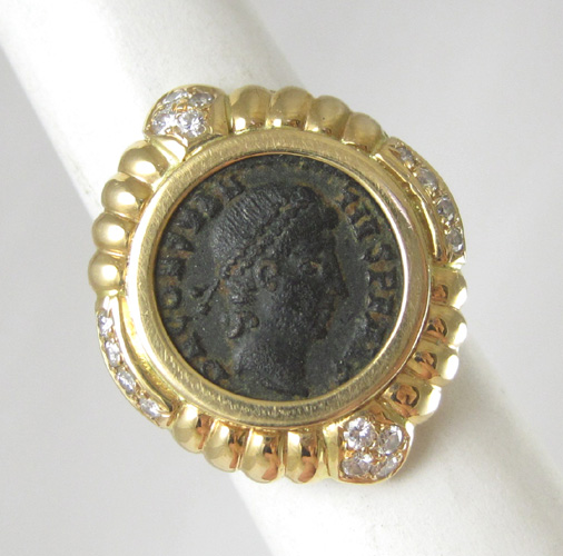 Appraisal: BRONZE COIN DIAMOND AND EIGHTEEN KARAT GOLD RING with certificate