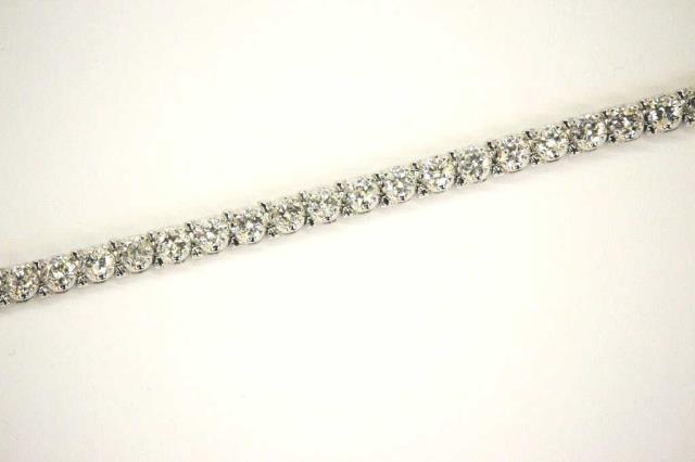 Appraisal: A K white gold bracelet with thirty-five fine white diamonds