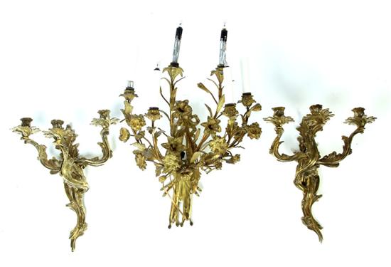 Appraisal: THREE WALL SCONCES American th century brass Pair of candle