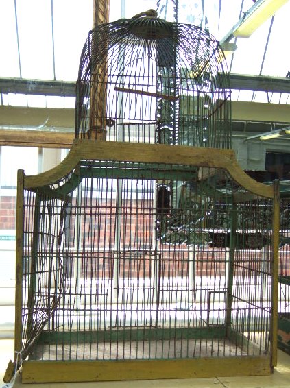 Appraisal: A French painted wood and wire work bird cage early