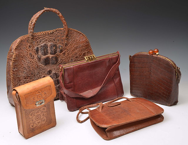 Appraisal: AN EARLY TH CENTURY CROCODILE SKIN HANDBAG a further crocodile