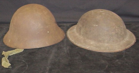 Appraisal: Two helmets the first a Japanese helmet missing soldered star