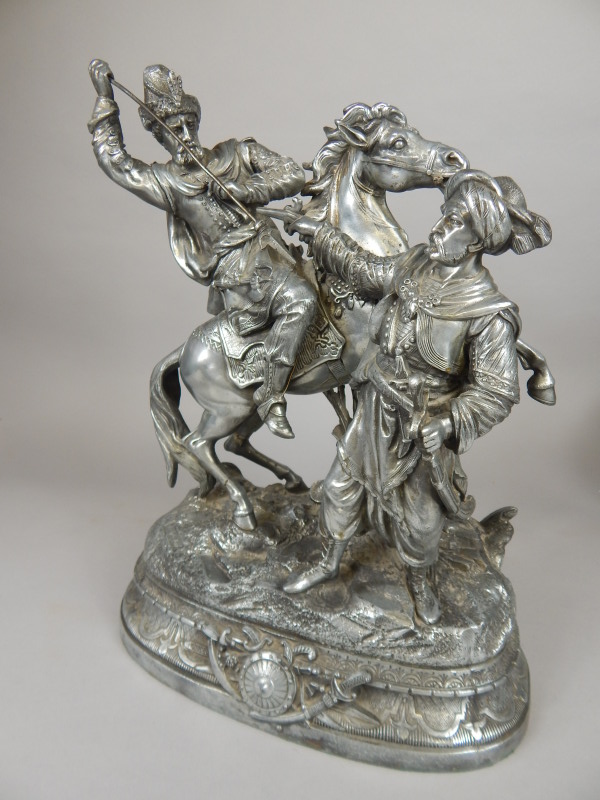 Appraisal: After Dorlos A spelter figure of Arabs in battle on