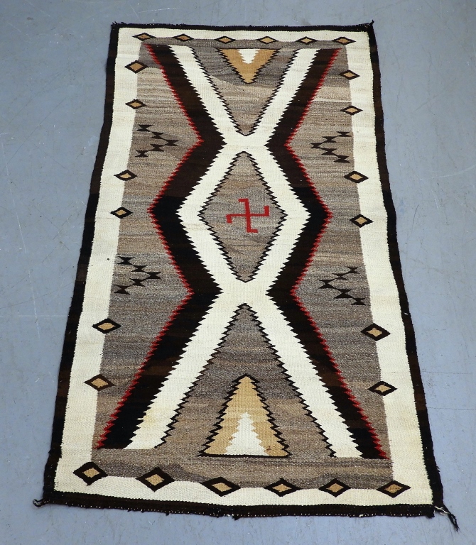 Appraisal: NAVAJO WHIRLING LOG EYE DAZZLER RUG United States th CenturyBrown