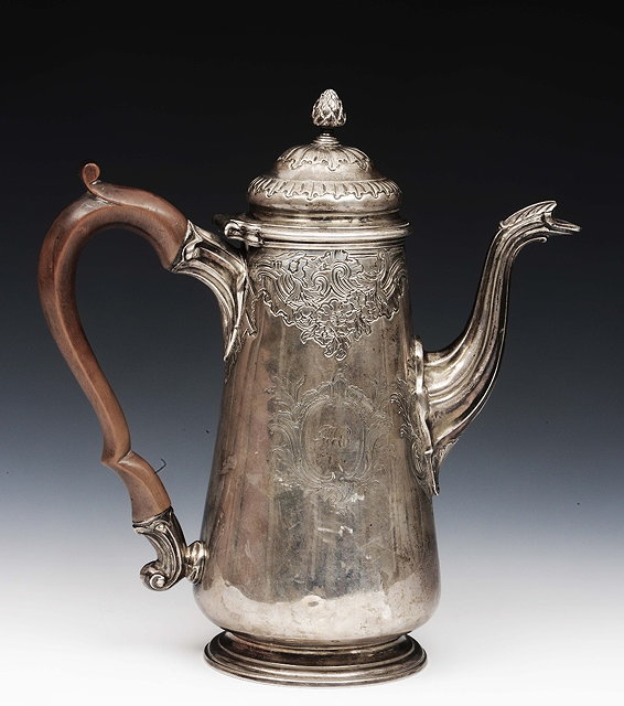 Appraisal: A George III silver coffee potof tapering cylindrical form with