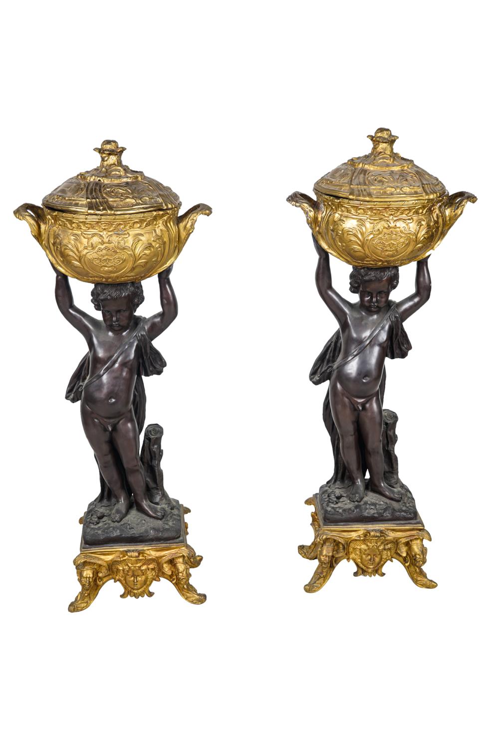 Appraisal: PAIR OF BRONZE CHERUB FIGURESpatinated bronze and gilt bronze each