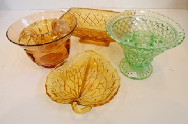 Appraisal: THREE PIECES OF AMBER GLASS GREEN GLASS CENTRE BOWL