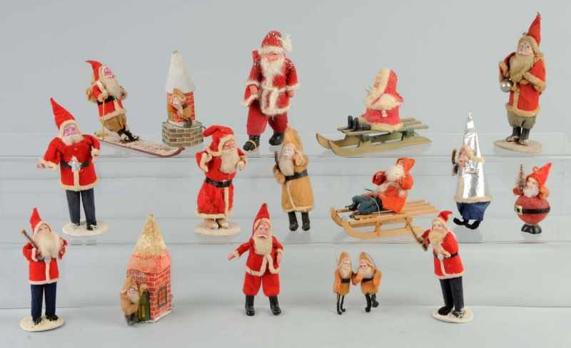 Appraisal: Lot of Cloth Santas Description Includes two Santas with cardboard