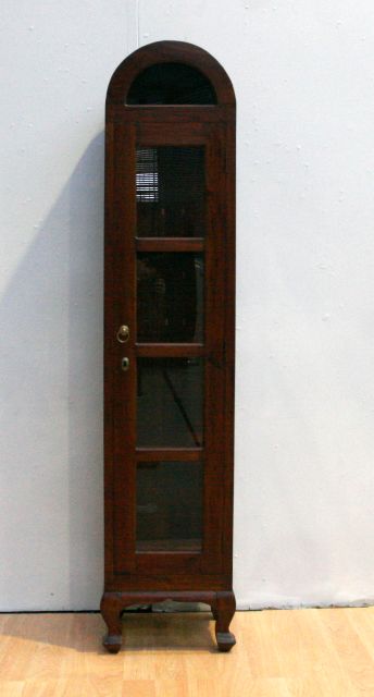 Appraisal: A mahogany parlour vitrine cabinet on thick cabriole legs cm