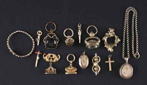 Appraisal: Group of gold-filled pieces to include watch fobs a bracelet