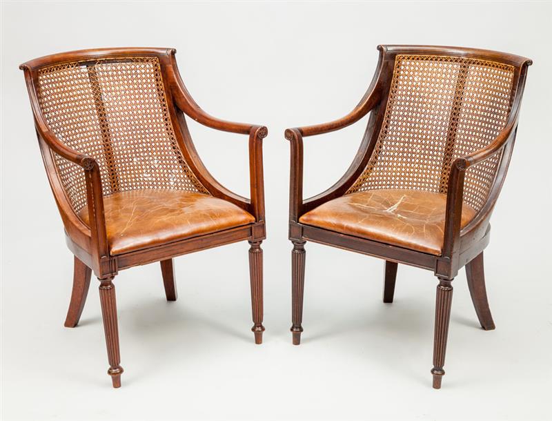 Appraisal: Pair of Regency Style Carved Mahogany Armchairs With caned backs