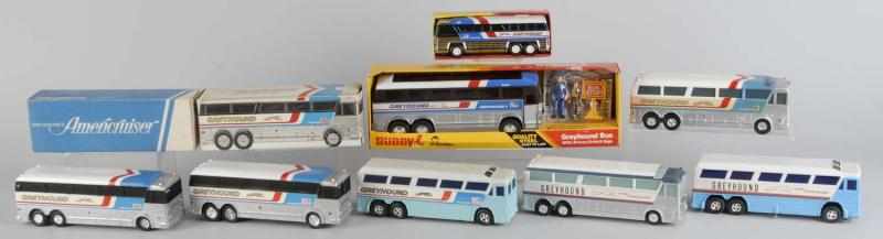 Appraisal: Lot of Tin Plastic Greyhound Bus Toys Description Some are