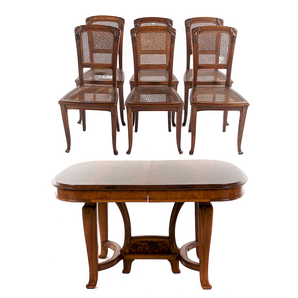 Appraisal: Louis Majorelle Style Walnut Dining Table Chairs th century table