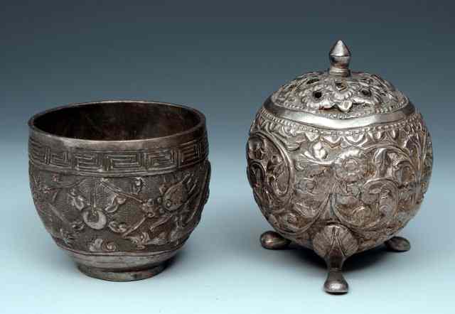 Appraisal: A CHINESE SILVER MINIATURE CUP decorated with dragons and an