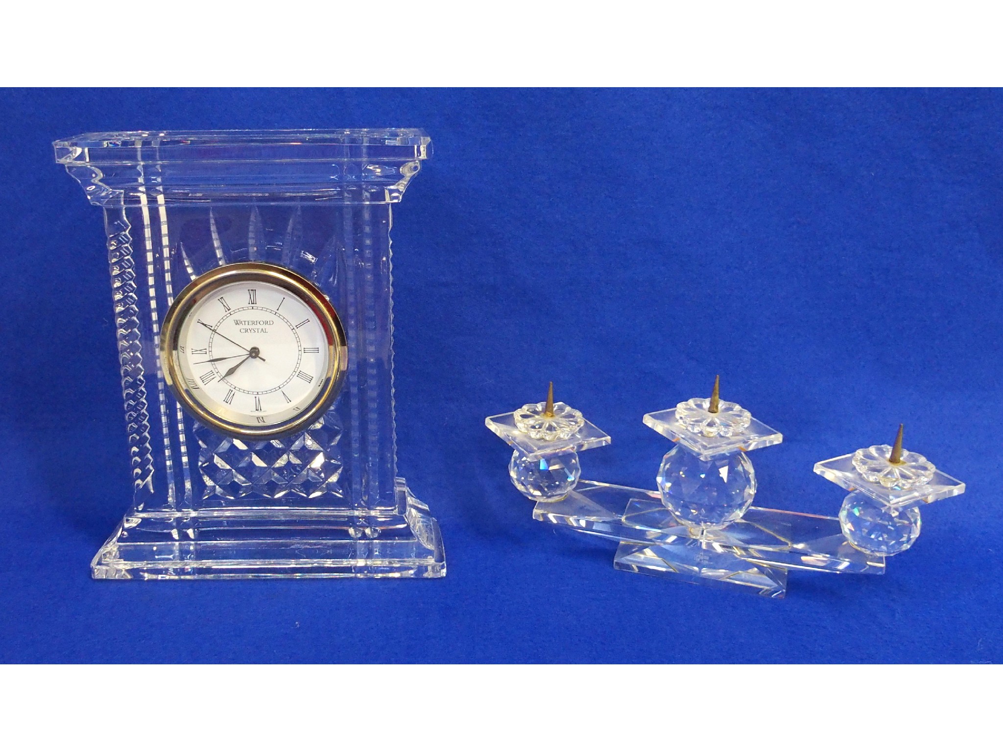 Appraisal: Waterford clock and a Swarovski candlestand