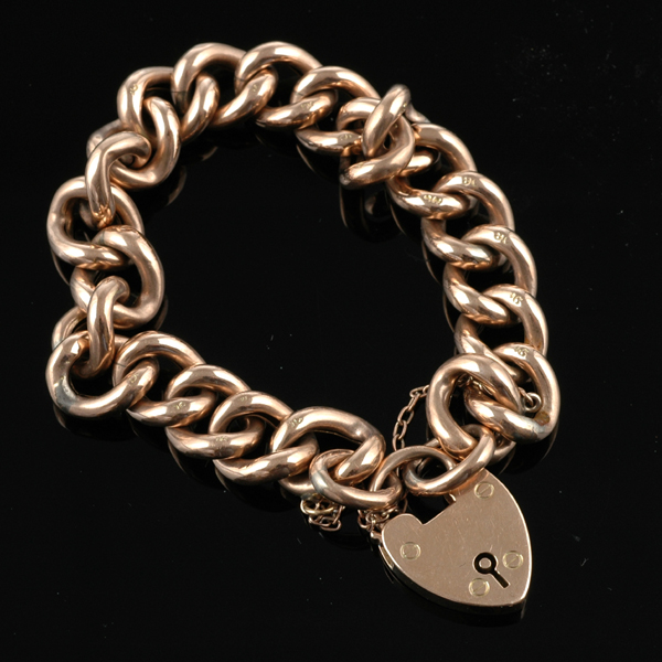 Appraisal: A gold padlock bracelet The ct gold hollow curb link