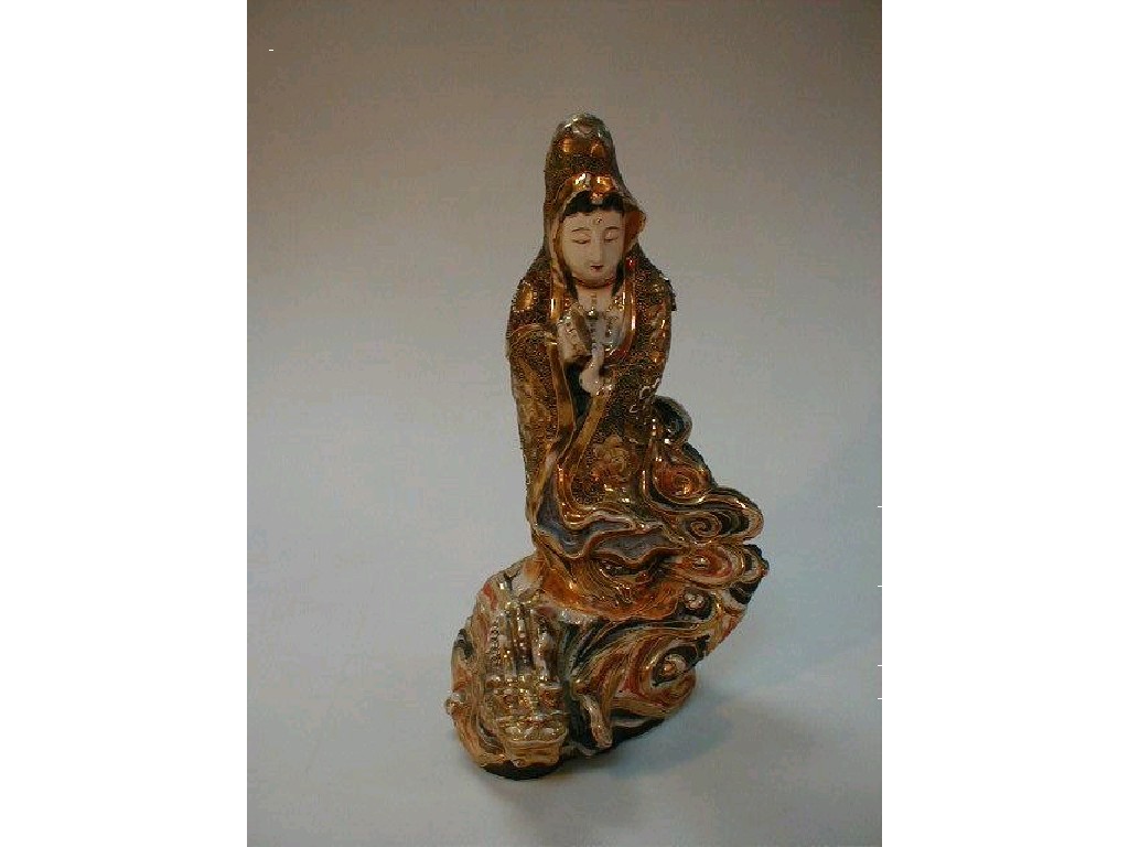 Appraisal: A Japanese satsuma figure of a goddess and a serpent