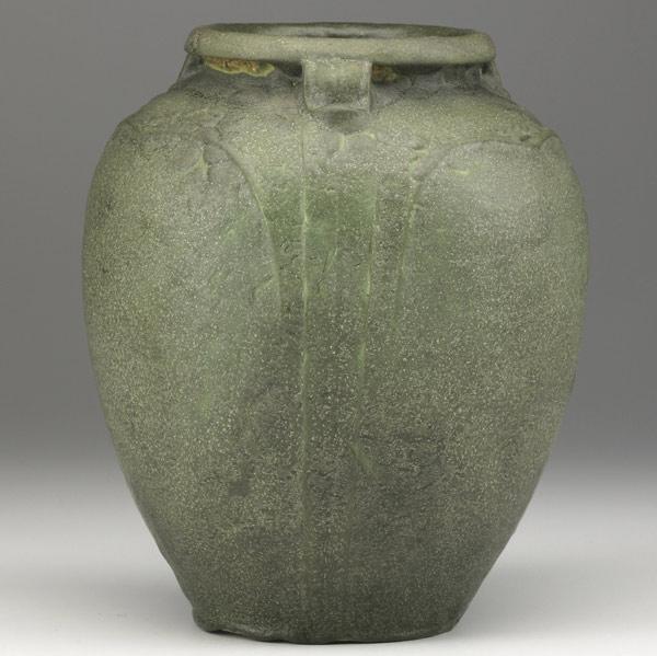 Appraisal: RUTH ERICKSONGRUEBYBulbous matte green vase with three handles and curled