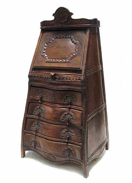 Appraisal: A Portuguese Baroque style mixed wood secretary height ft in