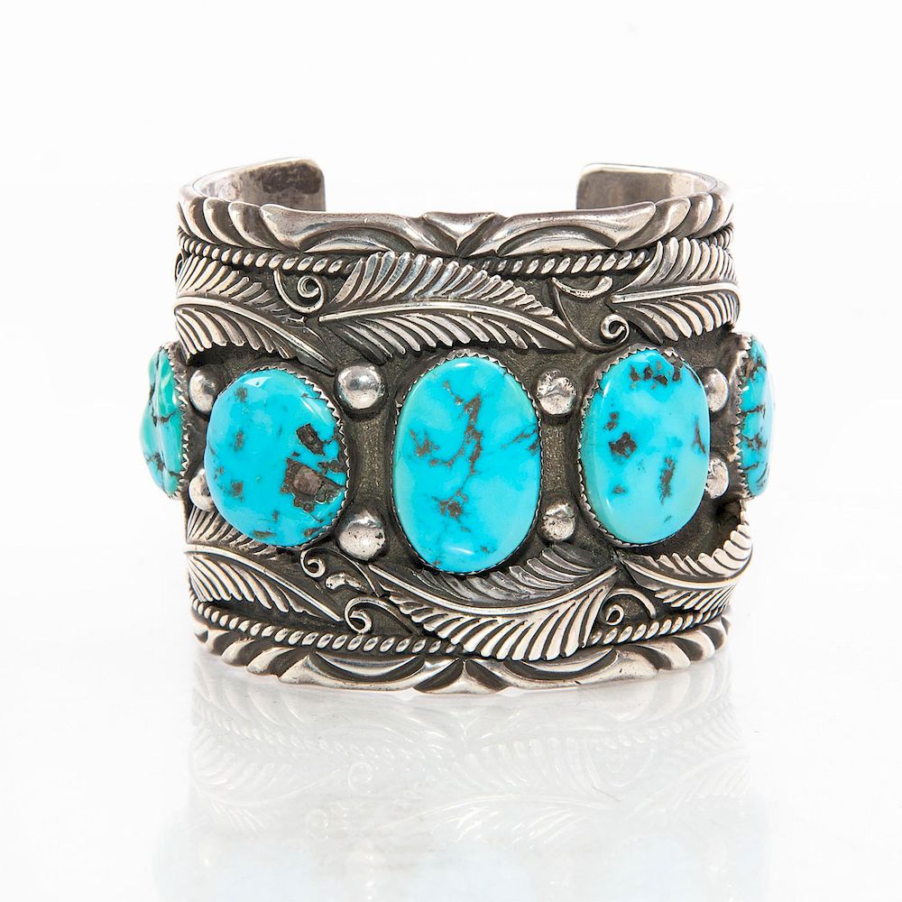 Appraisal: HEAVY SILVER NAVAJO TURQUOISE BRACELET Ornately detailed bracelet with pieces