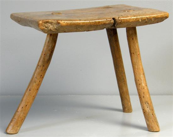 Appraisal: Rustic th Century elm stool on three turned legs PROVENANCE