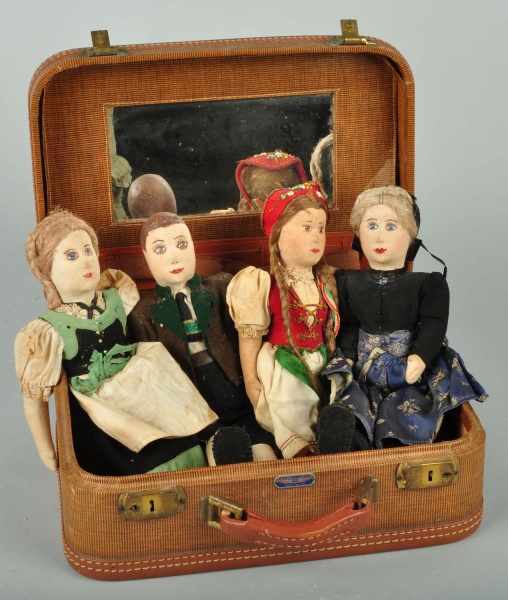 Appraisal: Lot of Handmade Cloth Dolls in Suitcase Description Appear to