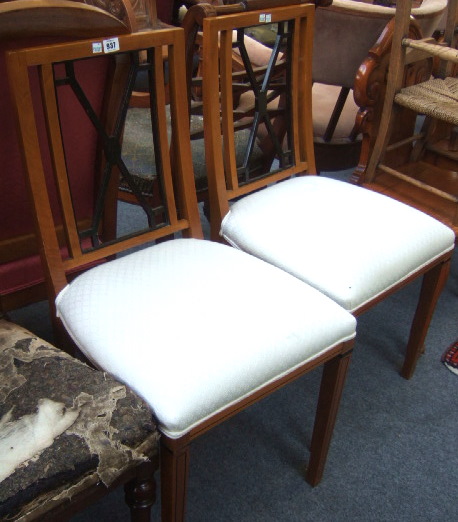 Appraisal: A pair of birch and ebonised square back chair of