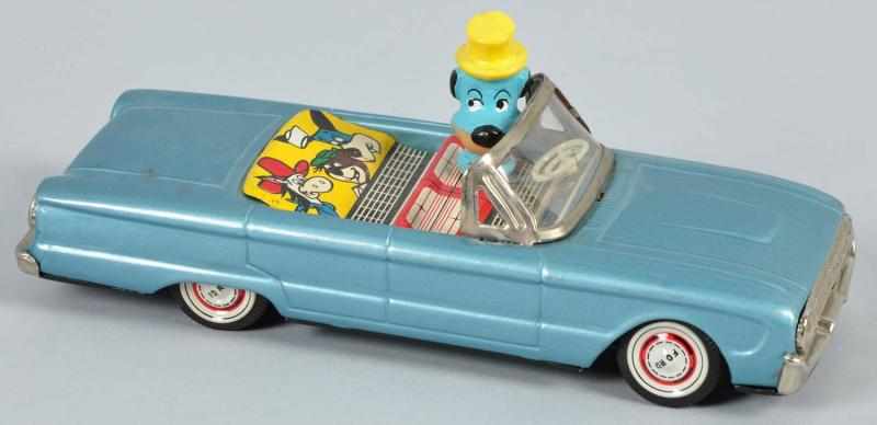 Appraisal: Tin Linemar Huckleberry Hound Car Friction Toy Description Japanese Working