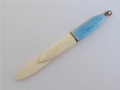 Appraisal: An ivory combination letter-opener and book mark in the style