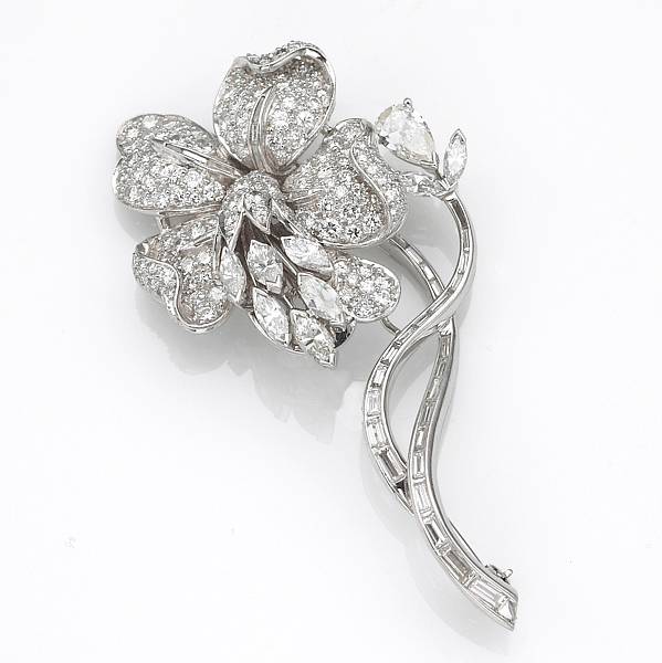 Appraisal: A diamond and platinum flower brooch with reference estimated total