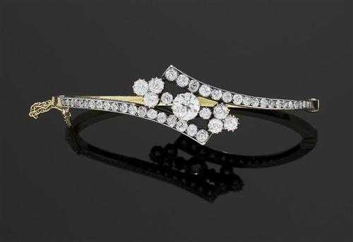 Appraisal: DIAMOND BRACELET ca Silver over yellow gold Very fancy Crois